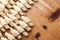 Process of cooking small croissants with cerry for breakfast. Preparation of baking on a rustic wooden background with dusting of