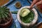 Process of cooking tacos with grilled flank beef steak with handmade guacamole.