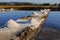 The process of crystallization of sea water into salt in the traditional way in Indonesia