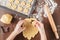 Process of extrusion gingerbread cookies in the shape of a star.