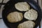 Process of Frying pancakes in a pan