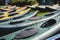 A process of kayaking in the city river canals, with colorful canoe kayak boat paddling, process of canoeing, group of kayaks