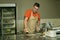 The process of making bread. The chef kneads the dough by hand