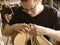 The process of making a cutaway on classical guitar.