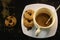 the process of making flat white coffee by pouring steam milk into a cup of espresso, served with low-fat biscuits so that you