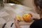 The process of making a Halloween pumpkin. cleansing of seeds. horror theme and Hallowe`en