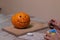 The process of making a Halloween pumpkin. light a match and candle. horror theme and Hallowe`en