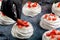 The process of making Pavlova dessert