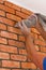 Process of making a red brick wall, home renovation