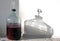 The process of making red homemade wine. A 20 liter glass bottle with an airlock in a cork.