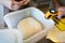 The process of making wheat bread in an artisan bakery. Measuring the temperature of the dough.