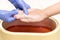 Process paraffin treatment of female hands