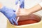 Process paraffin treatment of female hands