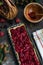 Process of preparation raspberry and blackberry pie, top view on rustic wooden table