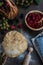 Process of preparation raspberry and blackberry pie, top view on rustic wooden table