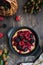 Process of preparation raspberry and blackberry pie, top view on rustic wooden table