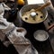 Process of preparation sponge lemon cake in bundt pan on rustic wooden table