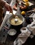 Process of preparation sponge lemon cake in bundt pan on rustic wooden table