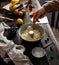 Process of preparation sponge lemon cake in bundt pan on rustic wooden table