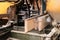 The process of processing boards at the sawmill, close-up.