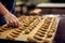 A process of production bakery products at the factory. Sweet cake on the production line at the bakery