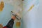 The process of putty the walls with large spatula