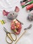 Process of stuffing soft toy stuffed animal textile mouse with synthetic wadding