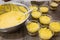 Processing to make 9-layer chocolate mango and coconut cream cake. Ingredients: mango, coconut extract, yellow, yellow lime, whipp