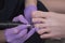 Processing toenails, pedicure. Gloved hands with a pedicure cutter. Close-up