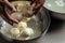 The processing Traditional Italian mozzarella, Cheesemaker, showing freshly made mozzarella