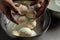 The processing Traditional Italian mozzarella, Cheesemaker, showing freshly made mozzarella