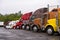 Procession colorful trucks on the truck stop after the rain