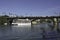 The procession passes over the Guadalquivir river on the Triana bridge in Seville