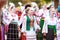 Procession of students of the Institute of culture, dancers in Cossack traditional dress, colored skirt, green trousers and maroon