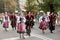 Procession of students of the Institute of culture, dancers in Cossack traditional dress, colored skirt, green trousers and maroon