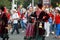 Procession of students of the Institute of culture, dancers in Cossack traditional dress, colored skirt, green trousers and maroon