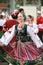 Procession of students of the Institute of culture, dancers in Cossack traditional dress, colored skirt, green trousers and maroon