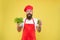 Producing fresh juice. Squeezing fresh smoothie juice. Man bearded chef hold lettuce and smoothie drink bottle. Detox