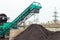 Producing organic soil at industrial compost plant