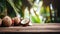 Product display rustic old wooden boards table with coconut farm in background.