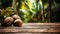 Product display rustic old wooden boards table with coconut farm in background.