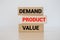 Product marketing concept. Business marketing words demand, product and value written on wooden blocks