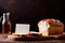 Product packaging mockup photo of bread with blank white card, studio advertising photoshoot