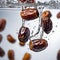 Product Photography of Dipped Dates in Water Splash