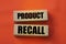 Product Recall words on wooden blocks. Warranty and quality control concept