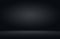 Product showcase spotlight on black gradient background.