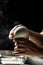 Production process of mozzarella cheese. woman working in a small family creamery is processing the final steps of making a cheese