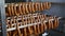 The production of sausages. ready-made sausages hung on the conveyor