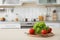 Products and blurred view of kitchen interio