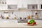 Products and blurred view of kitchen interior